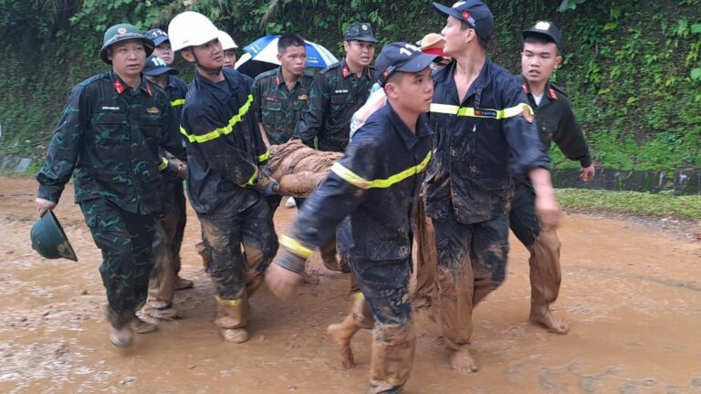 At least eleven dead in Vietnam landslide that swept away van