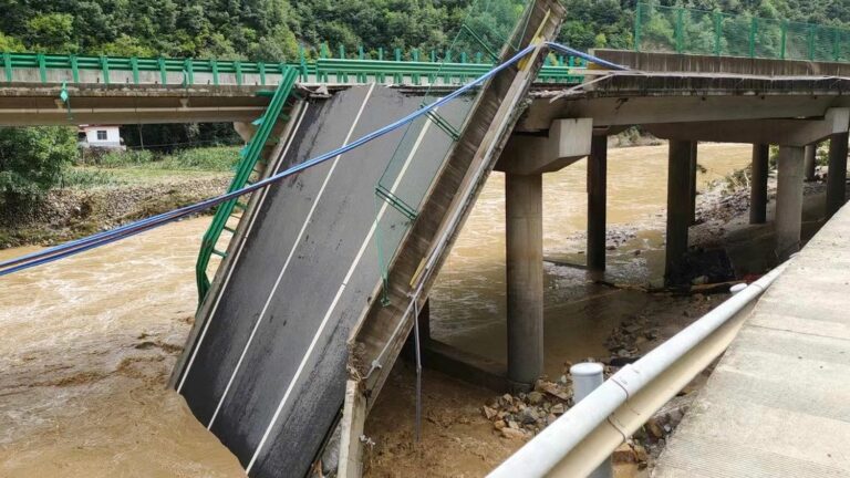 Bridge collapses in China after torrential rains, leaving 12 dead, 31 missing