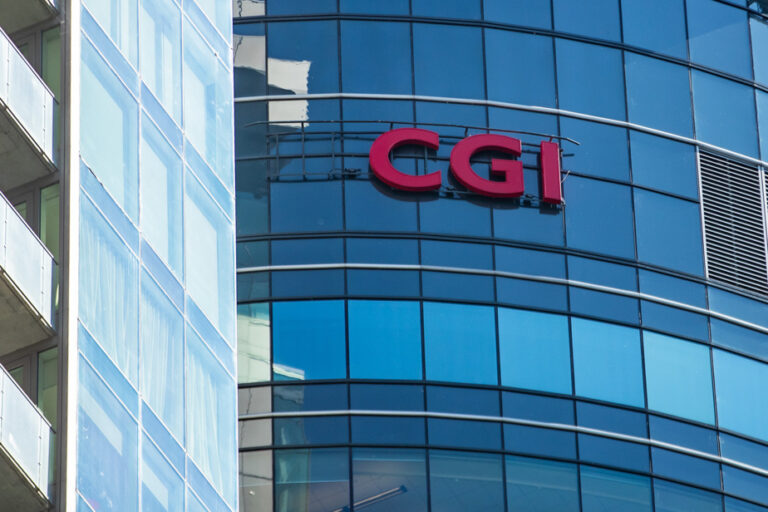 CGI increases third-quarter profit, will pay dividend