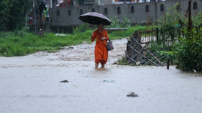 Floods and landslides in Nepal leave at least 14 dead, nine missing