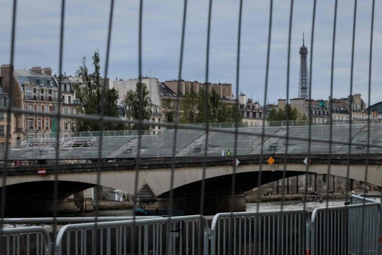 The banks of the Seine are secured as the opening ceremony approaches