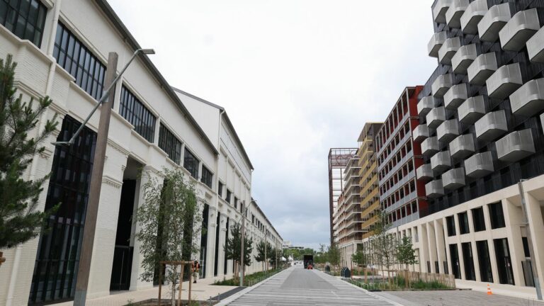 The first athletes arrive at the Olympic Village