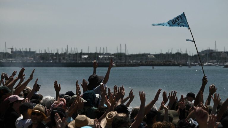 Thousands of protesters march towards the port of La Rochelle, clashes break out on the fringes of a procession