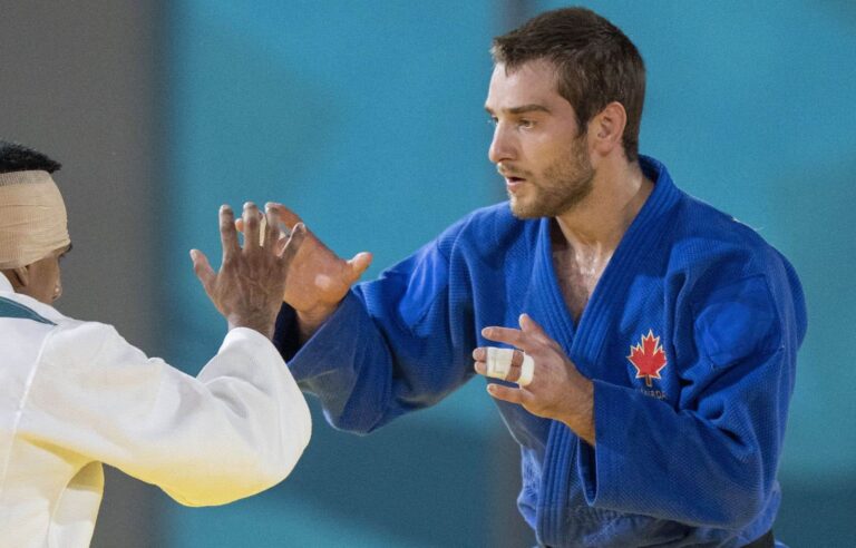 Two judokas are given the role of being “tossed around” by the athletes of the Canadian judo team