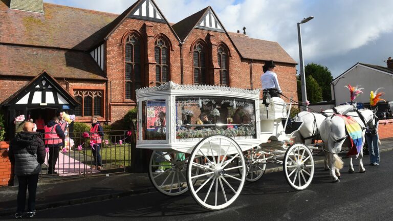 Balloons, stuffed animals and emotion at the funeral of a 7-year-old girl