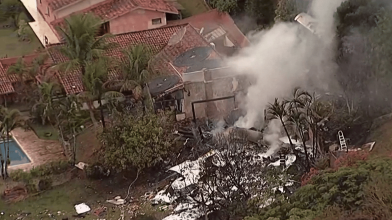 62 dead after plane crashes among houses