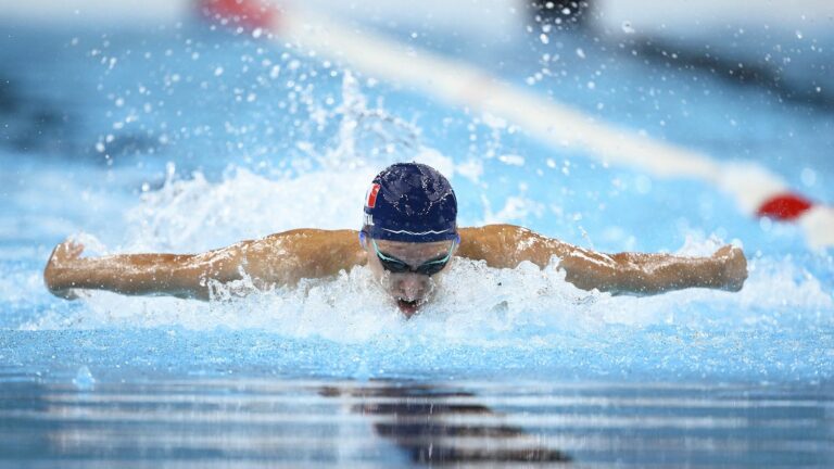 Alex Portal wins silver medal in 100m butterfly