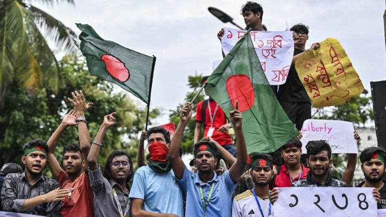 At least eight people killed in Bangladesh in clashes between protesters and government supporters