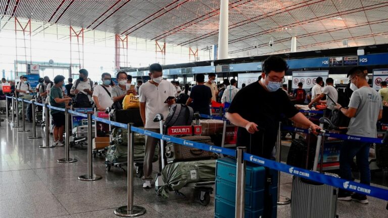 China tightens checks on arrivals