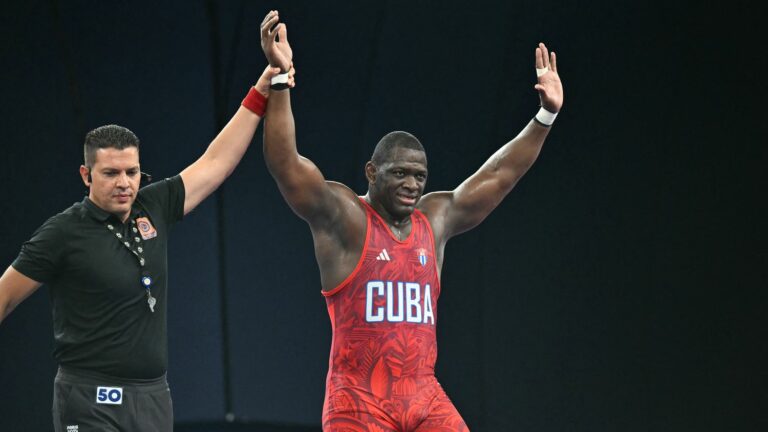 Cuban wrestler Mijain Lopez makes history by winning fifth consecutive Olympic title