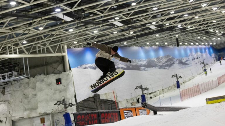 Despite environmental consequences, skiers enjoy the snow in the middle of summer in Madrid