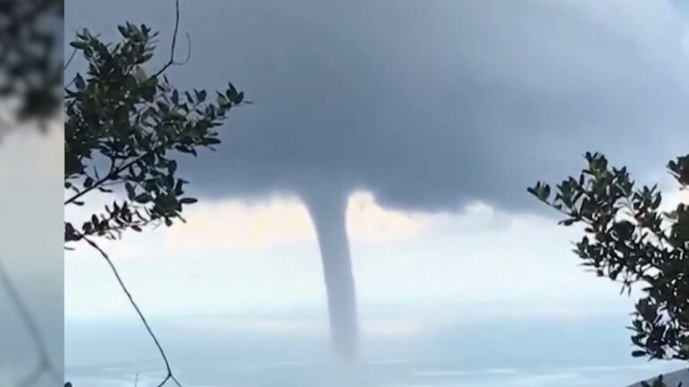 How can we explain the phenomenon of waterspouts?