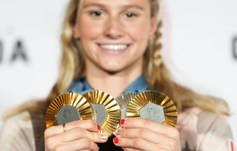 How much does an athlete receive for an Olympic medal?