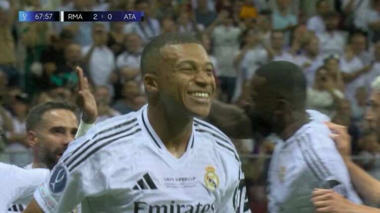 Kylian Mbappé scores a goal in his first match with Real Madrid