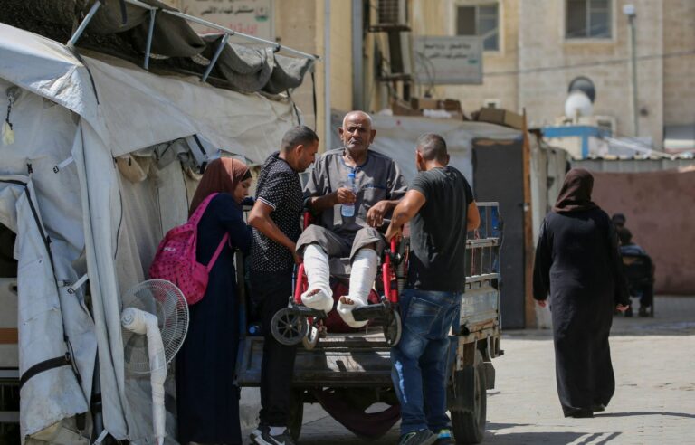 Patients at al-Aqsa Martyrs Hospital in central Gaza Strip flee after Israeli evacuation order