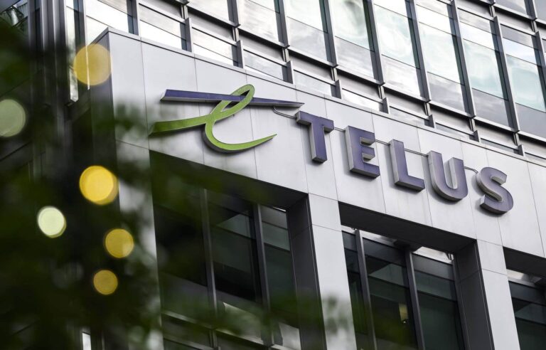 Several dozen people demonstrated in front of the Montreal offices of the Telus company