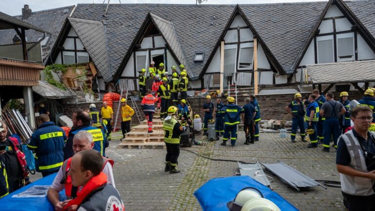 Two killed in German hotel collapse, guests still buried