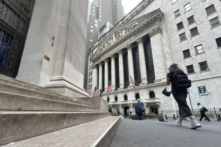 Wall Street ends down, marking the end of a euphoric streak in New York