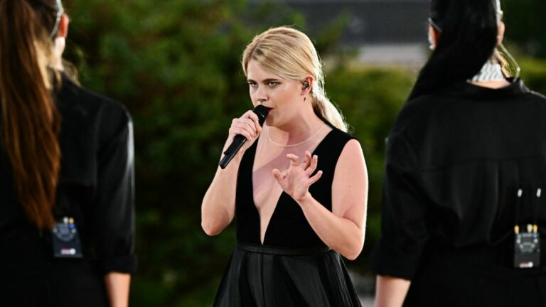 Zaho de Sagazan launches the show with a moving “Under the Paris Sky” at the Tuileries