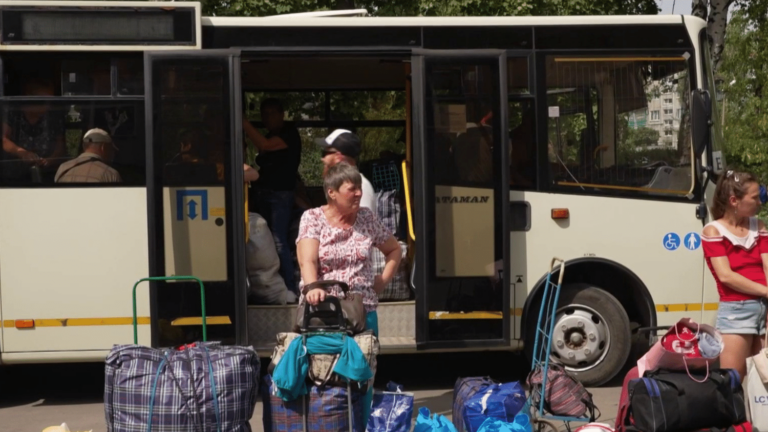 civilians fleeing Pokrovsk in the face of Russian advance