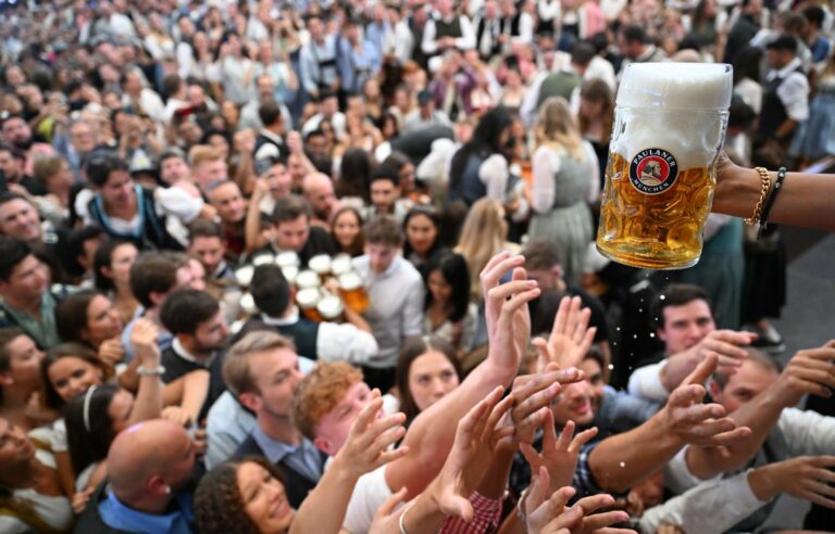 Beer is served under increased security at the 189th Oktoberfest in Munich