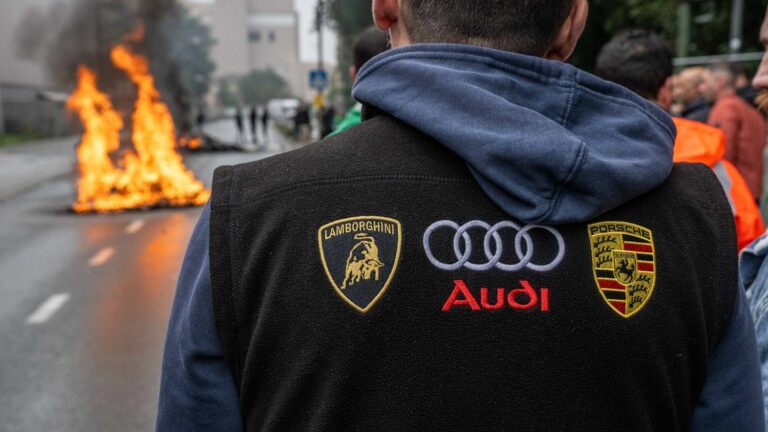 Belgian car industry unions protest against announced job cuts