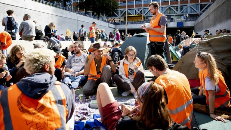 In the Netherlands, environmental activists from Extinction Rebellion close the highway leading to The Hague in protest against fossil fuel subsidies