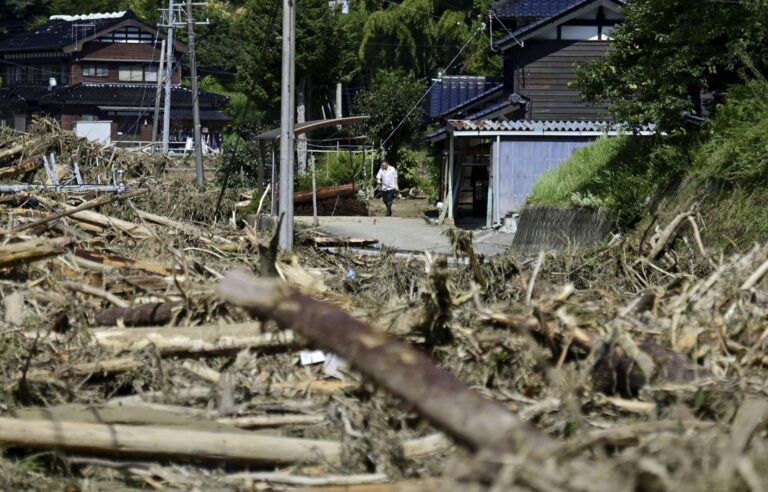 Japan: Search for missing people after floods and landslides kill seven