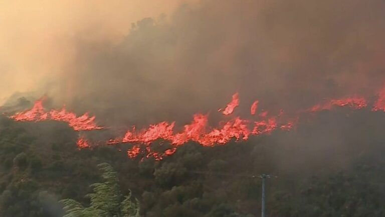 Village threatened by violent fire, residents evacuated