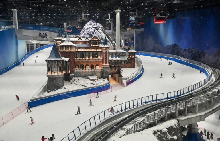 World’s largest indoor ski slope opens in China after record heat