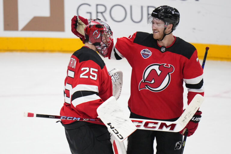 Devils beat Sabers 4-1 in NHL season opener