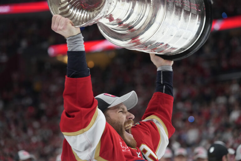 Members of the Panthers receive their Stanley Cup rings