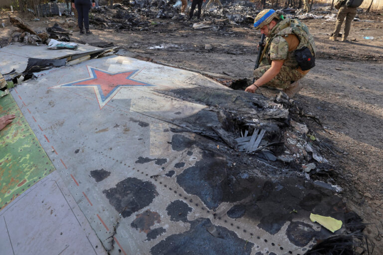 Ukraine shoots down warplane, Russia claims advances in the east