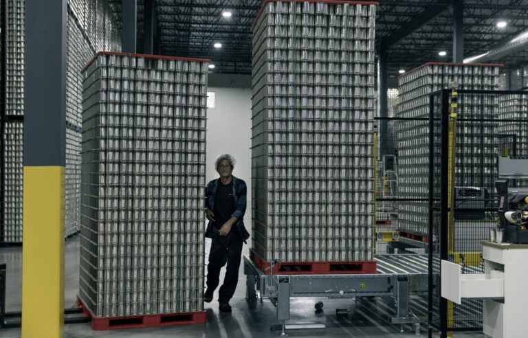 Workers from all over to make cans of maple syrup here