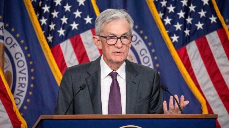 Federal Reserve Signals Patience on Interest Rate Cuts Amid Trump's Pressure