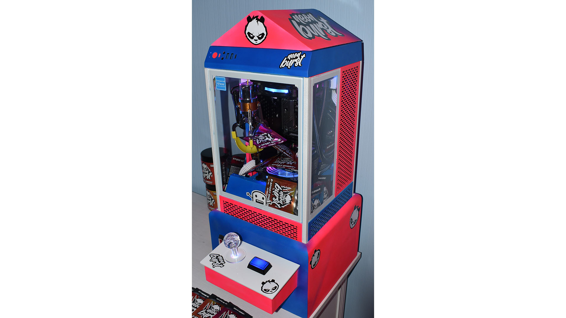 Le PC de jeu d'arcade griffe en bleu et rouge