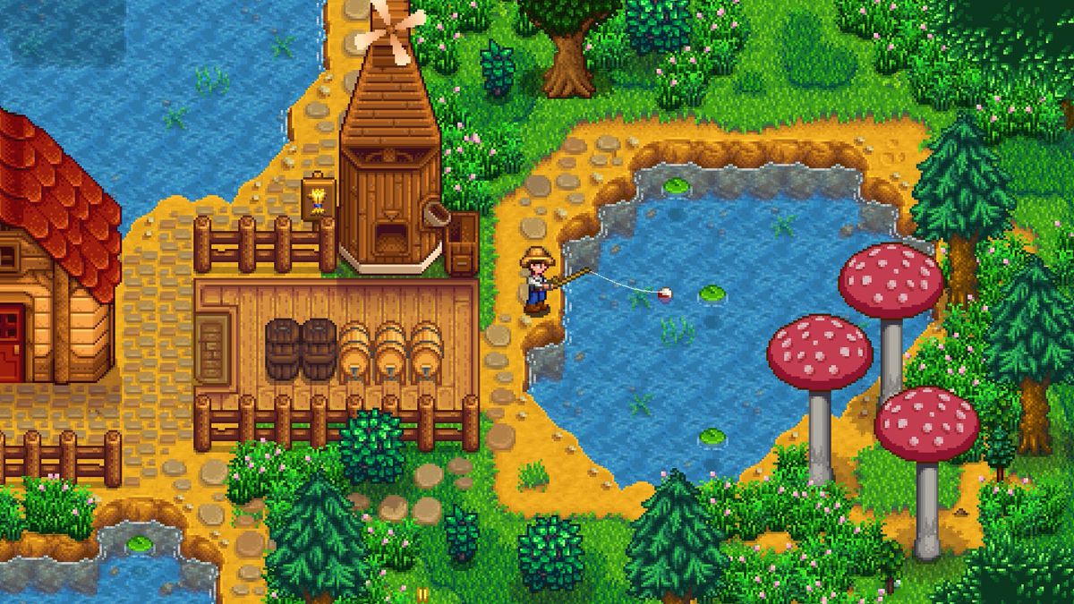Le personnage du joueur pêche dans Stardew Valley dans sa ferme à côté d'un moulin et de quelques champignons géants.