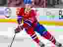 MONTRÉAL, QUÉ. : \2 avril\ 2024 -- Juraj Slafkovsky des Canadiens de Montréal manipule la rondelle à travers la ligne bleue lors de la première période du match de la Ligue nationale de hockey contre les Panthers de la Floride à Montréal le mardi 2 avril 2024.