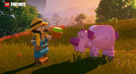 A LEGO Fortnite character feeding an animal treat to a pig