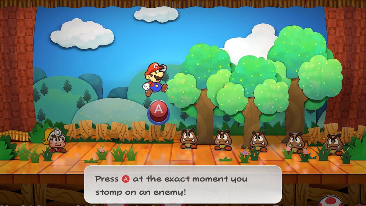 Mario saute vers un groupe de Goombas dans une bataille scénique dans Paper Mario : The Thousand-Year Door