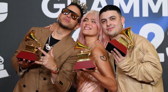 SEVILLE, SPAIN - NOVEMBER 16: (L-R) Ovy On The Drums, Karol G, and  Kevyn Mauricio Cruz pose with awards during The 24th Annual Latin Grammy Awards on November 16, 2023 in Seville, Spain. (Photo by Borja B. Hojas/Getty Images for Latin Recording Academy)