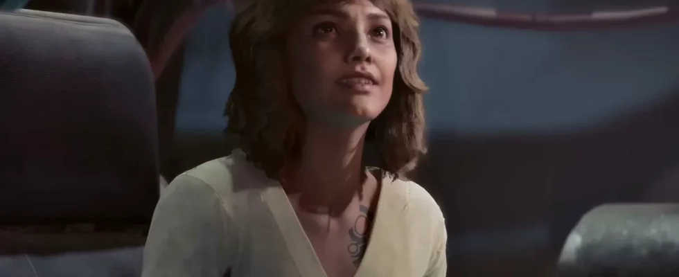 Star Wars Outlaws, a woman in a white top and brown hair sitting inside a cockpit of a spaceship.