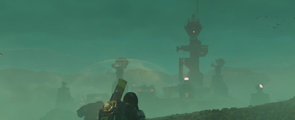 Helldivers 2 image of a player looking at a compound in distance