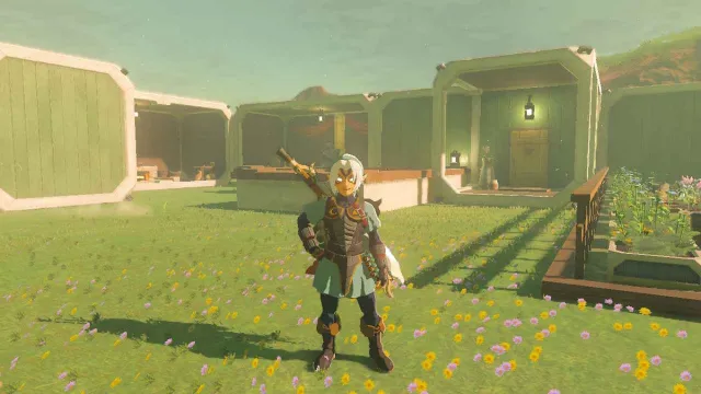 Link debout devant une maison relaxante dans The Legend of Zelda : Tears of the Kingdom.