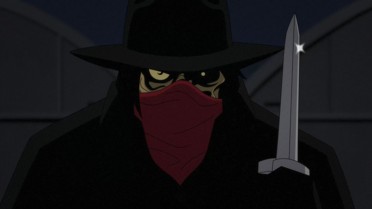 Un homme mystérieux, peut-être Clayface, dont le visage grotesque est caché par un chapeau et un bandana, tient un couteau dans un plan de la série animée Batman : Caped Crusader.