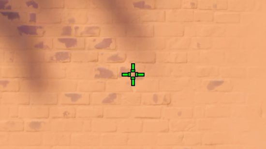 Meilleur réticule amusant de Valorant : Quatre lignes vertes qui ressemblent à des tuyaux de Mario ou Flappy Bird sur un mur de Valorant.