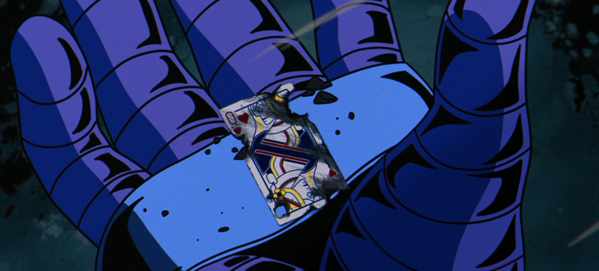La main d'Apocalypse, avec l'une des cartes à jouer brûlées de Gambit – la reine de cœur – nichée dedans. 