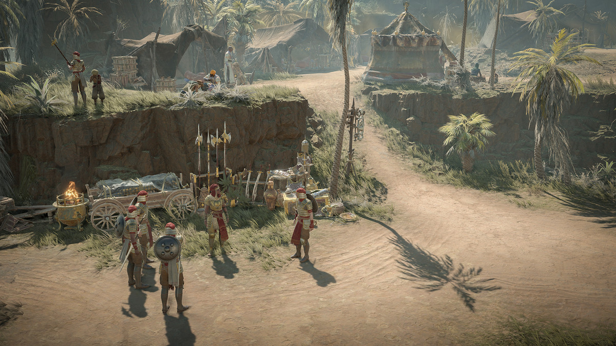 quelques mercenaires des Iron Wolves se tiennent dans un agréable camp tropical dans Diablo 4