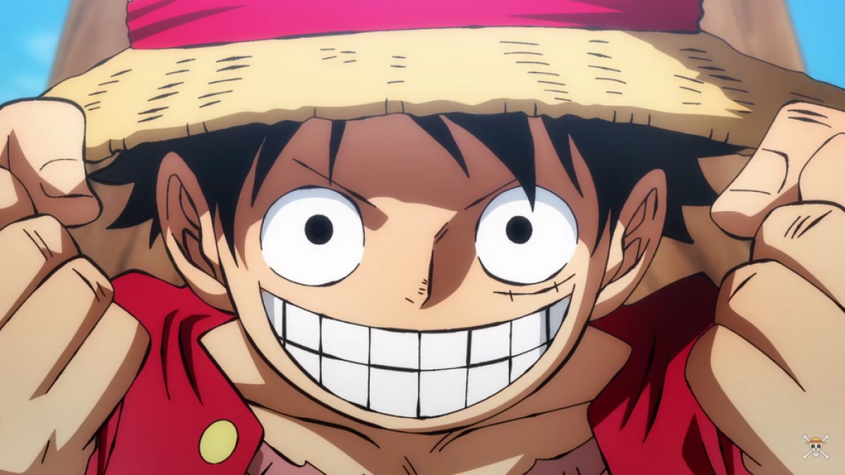 Luffy souriant dans One Piece.  Cet article concerne One Piece : tous les chapeaux de paille classés par popularité