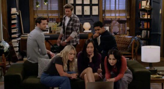 Still from How I Met Your Father, showing the entire cast gathered around a laptop looking invested